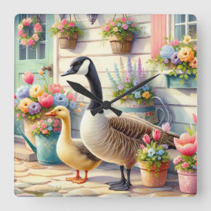 Illustration von Gänsen im Cottage-Garten im Frühl Quadratische Wanduhr