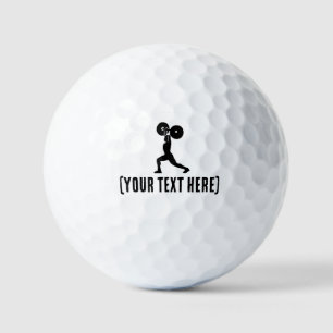 Im Fitnessraum Personal Trainer Golfball