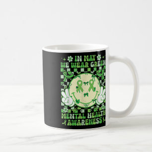 Im Mai tragen wir ein grünes Mental Health Awarene Kaffeetasse