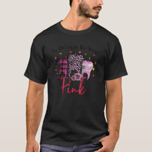 Im Oktober tragen wir pinkfarbenes Geschirr mit en T-Shirt