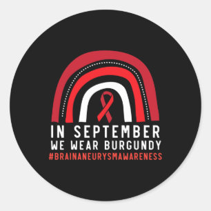 Im September tragen wir Burgundy Brain Aneurysm Aw Runder Aufkleber
