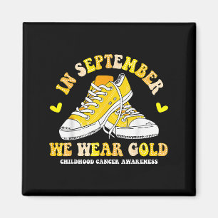 Im September tragen wir goldene Sneaker-Kinderkreb Magnet