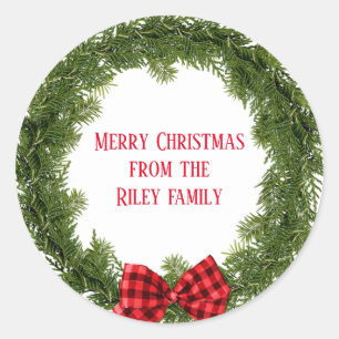 immergrüner Weihnachtskranz mit kariertem Bogen Runder Aufkleber