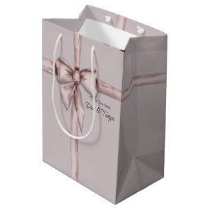 In einem rosa Bogen gefangen Mittlere Geschenktüte