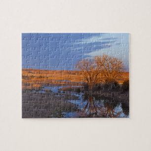 In Sonnenuntergangslicht getaucht der Calamus Rive Puzzle