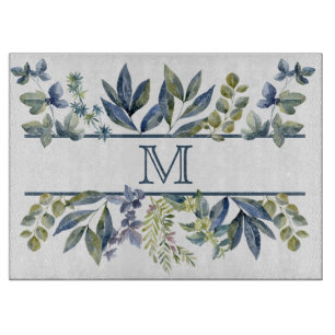 Indigo-Blau verlässt Grenzmonogramm Schneidebrett