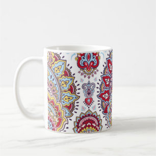 Indischer Pisley mit Blumen, ethnische Medaille. Kaffeetasse