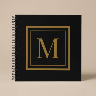 Individuelles Monogramm mit schwarzem und goldenem Notizbuch