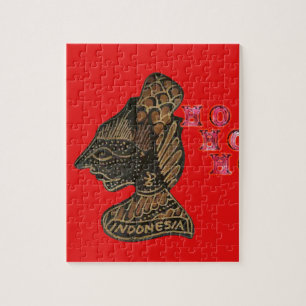 Indonesisches Schattenpuppet Hohoho-Design auf rot Puzzle