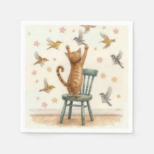 Ingwerkatze, die einen Vogel auf Papier fängt Serviette