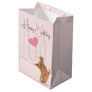 Ingwerkatze mit rosa Herzballon Mittlere Geschenktüte