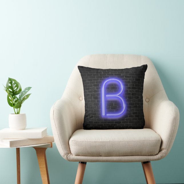 Initial B in Neon Lighting on Brick Kissen (Stuhl )