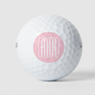 Initialmonogramm Weiß auf hellrosa Golfball