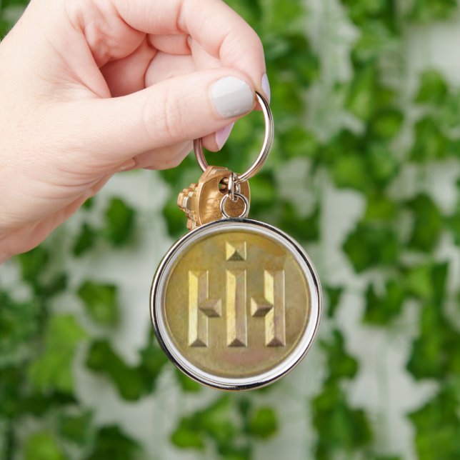 International Harvester Premium Golden Corporate Schlüsselanhänger (Hand)