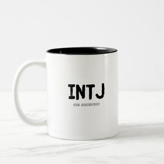 INTJ - The Architect (Black) Zweifarbige Tasse (Links)