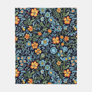 Intrigante Blumenkunst: Blaue und orangefarbene Bl Fleecedecke