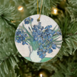 Ire | Vincent van Gogh Keramik Ornament<br><div class="desc">Ire (1890) | Original-Kunstwerk des niederländischen Postimpressionisten Vincent Van Gogh (1853-1890). Das Bild zeigt ein ruhiges Leben mit einem vollen Blumenstrauß auf einem grünen Tisch vor einem cremefarbenen,  weißen Hintergrund. Verwenden Sie die Entwurfstools,  um einen benutzerdefinierten Text hinzuzufügen oder das Bild zu personalisieren.</div>
