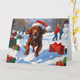Irish Red Setter Running Snow mit Weihnachtshut Karte