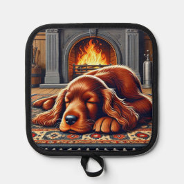 Irish Setter Welpe Schlafen durch einen warmen Kam Topflappen