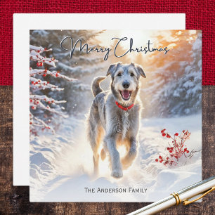 Irish Wolfhound beim Spaziergang im Schnee Frohe W Feiertagskarte