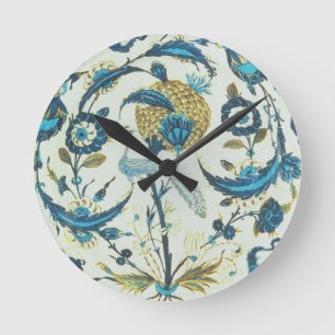 Iznik-Schale mit einem Pfau unter fl Runde Wanduhr