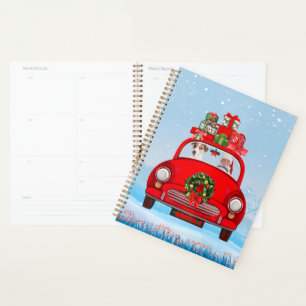 Jack Russell fährt mit dem Weihnachtsmann in Auto Planer