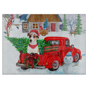 Jack Russell Hund in der Weihnachtslieferung LKW S Schneidebrett
