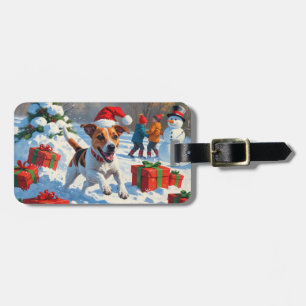 Jack Russell läuft in Snow mit Weihnachtsmütze Gepäckanhänger
