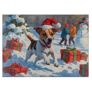 Jack Russell läuft in Snow mit Weihnachtsmütze Schneidebrett