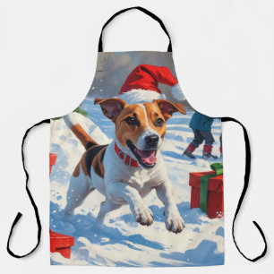 Jack Russell läuft in Snow mit Weihnachtsmütze Schürze