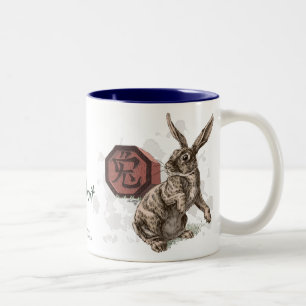 Jahr der Kaninchen-chinesischen Tierkreis-Kunst Zweifarbige Tasse