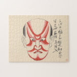 Japan - Traditionelle Kabuki - rot3 - Puzzle<br><div class="desc">Erleben Sie die kühne Eleganz der japanischen Tradition mit diesem atemberaubenden Puzzle-Design mit Kumadori-Gesicht aus dem Kabuki Theater. Kumadori ist ein traditioneller Kabuki-Make-up-Stil, bekannt für seine lebhaften Farben und dramatischen Designs, die die Natur eines Charakters unterstreichen. Der lebendige Ausdruck und die auffallende Symmetrie bieten den Rätselfreunden eine lustige und kulturell...</div>