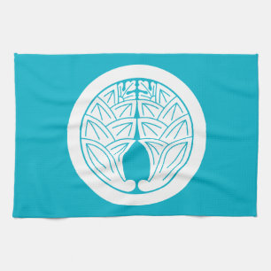 Japanische Ingwer umarmend im Kreis Handtuch