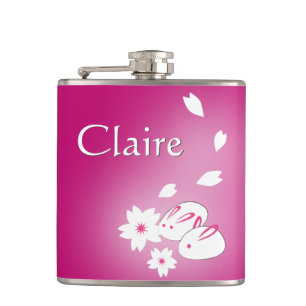 Japanische Schneerollen und Sakura-Hüftkolben Flachmann