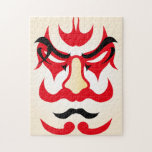 Japanischer Charme ∣ Traditionelles Kabuki Theater Puzzle<br><div class="desc">Erleben Sie die kühne Eleganz der japanischen Tradition mit diesem atemberaubenden Rätseldesign mit einem blauen Kumadori-Gesicht aus dem Kabuki Theater. Kumadori ist ein traditioneller Kabuki-Make-up-Stil, bekannt für seine lebhaften Farben und dramatischen Designs, die die Natur eines Charakters unterstreichen. Der lebendige Ausdruck und die auffallende Symmetrie bieten den Rätselfreunden eine lustige...</div>