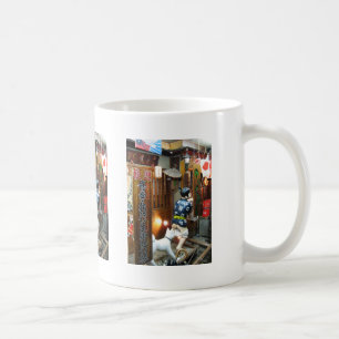 Japanischer Spaß - Hunde ziehen Ameisen herunter Kaffeetasse