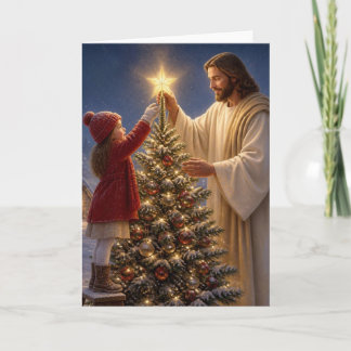 Jesus hilft einem kleinen Mädchen beim Schmücken d Feiertagskarte