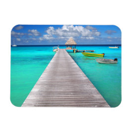 Jetty mit Booten in einer tropischen Lagune Magnet