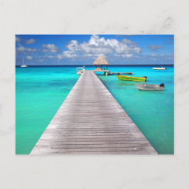 Jetty mit Booten in einer tropischen Lagune Postkarte