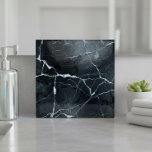 Jewel Tones Marble Abstract Onyx ID1288 Fliese<br><div class="desc">This striking ceramic tile features an elegant marble design in deep onyx accented with crisp white veining and subtle gradient shading. The luxurious dark jewel tones and dappled stone texture bring depth and sophistication to any space. Ideal for backsplash installations, bathrooms, or feature walls. Search ID1288 to see additional color...</div>