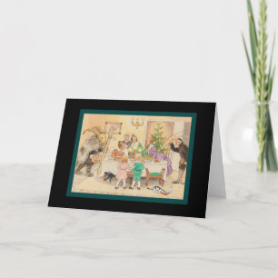 Jul-Ziege am Weihnachtstisch Feiertagskarte