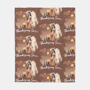 Junge amerikanische Ureinwohner, die auf einer Hol Fleecedecke