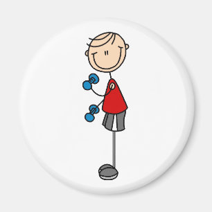 Junge, der Magneten ausübt Magnet