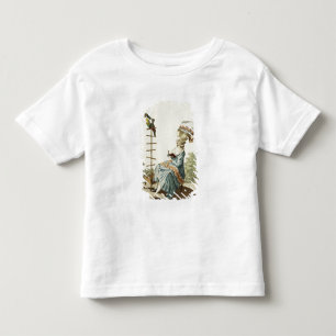 Junge Frau, die in einem Tageskleid mit Elabora li Kleinkind T-shirt