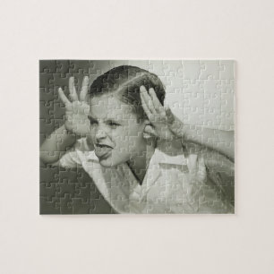 Junge macht Gesicht Puzzle