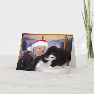 Junge mit Katze am Weihnachten