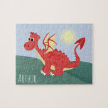 Jungen Niedlich und magisch, rot - walisischer Dra Puzzle<br><div class="desc">Dieses niedliche und moderne Puzzle-Design mit einem walisischen Drachen-Cartoon,  blauem Himmel und hügeligem Hintergrund kann mit Ihrem Jungennamen personalisiert werden. Das perfekte Geschenk zum Thema Wales für jedes Kind.</div>