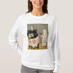 Junges Mädchen mit einer Gitarre und einem Kind T-Shirt