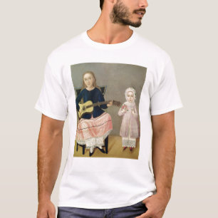 Junges Mädchen mit einer Gitarre und einem Kind T-Shirt