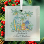 Jungle Animals Baby's First Christmas Ornament Aus Glas<br><div class="desc">Niedliche Baby's erste Weihnachtsschmuck die süßesten kleinen Dschungeltiere gerahmt mit Aquarelldschungel Blätter.</div>